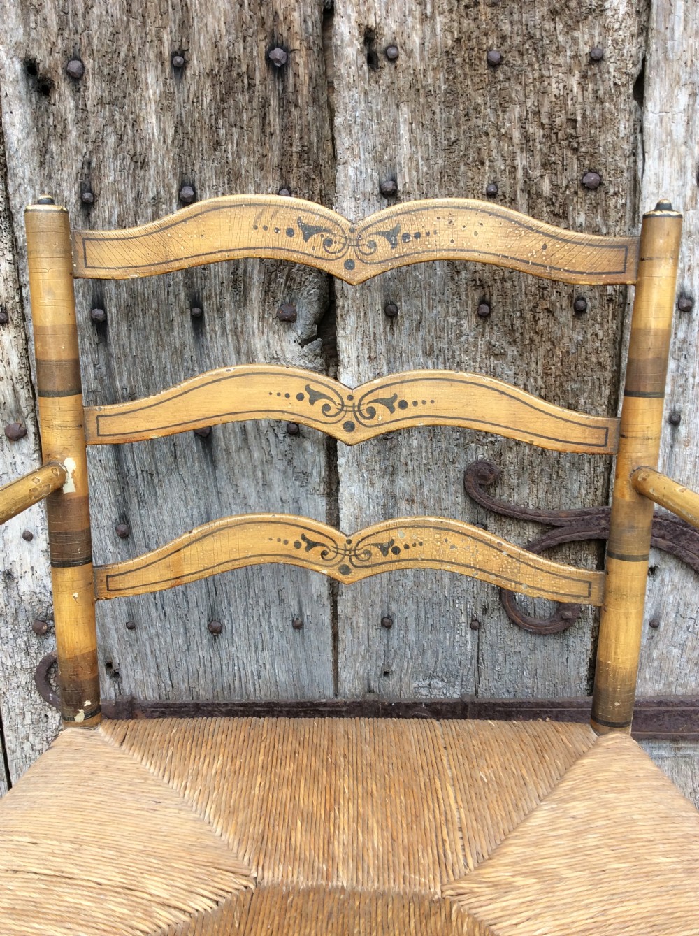 19thC Decorated rushed seat open arm armchair View VII