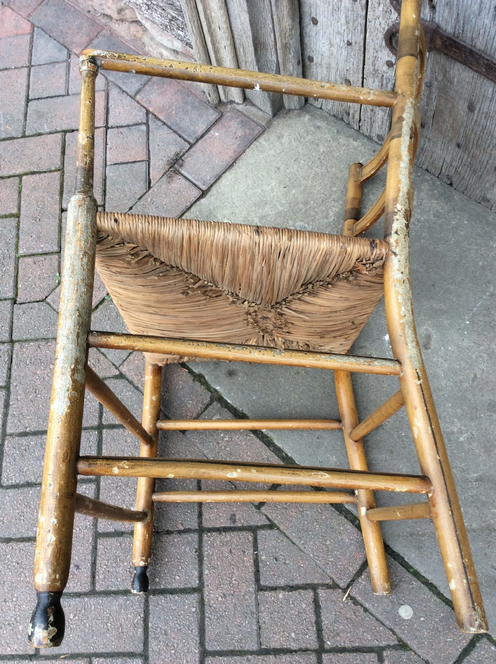 19thC Decorated rushed seat open arm armchair View IX