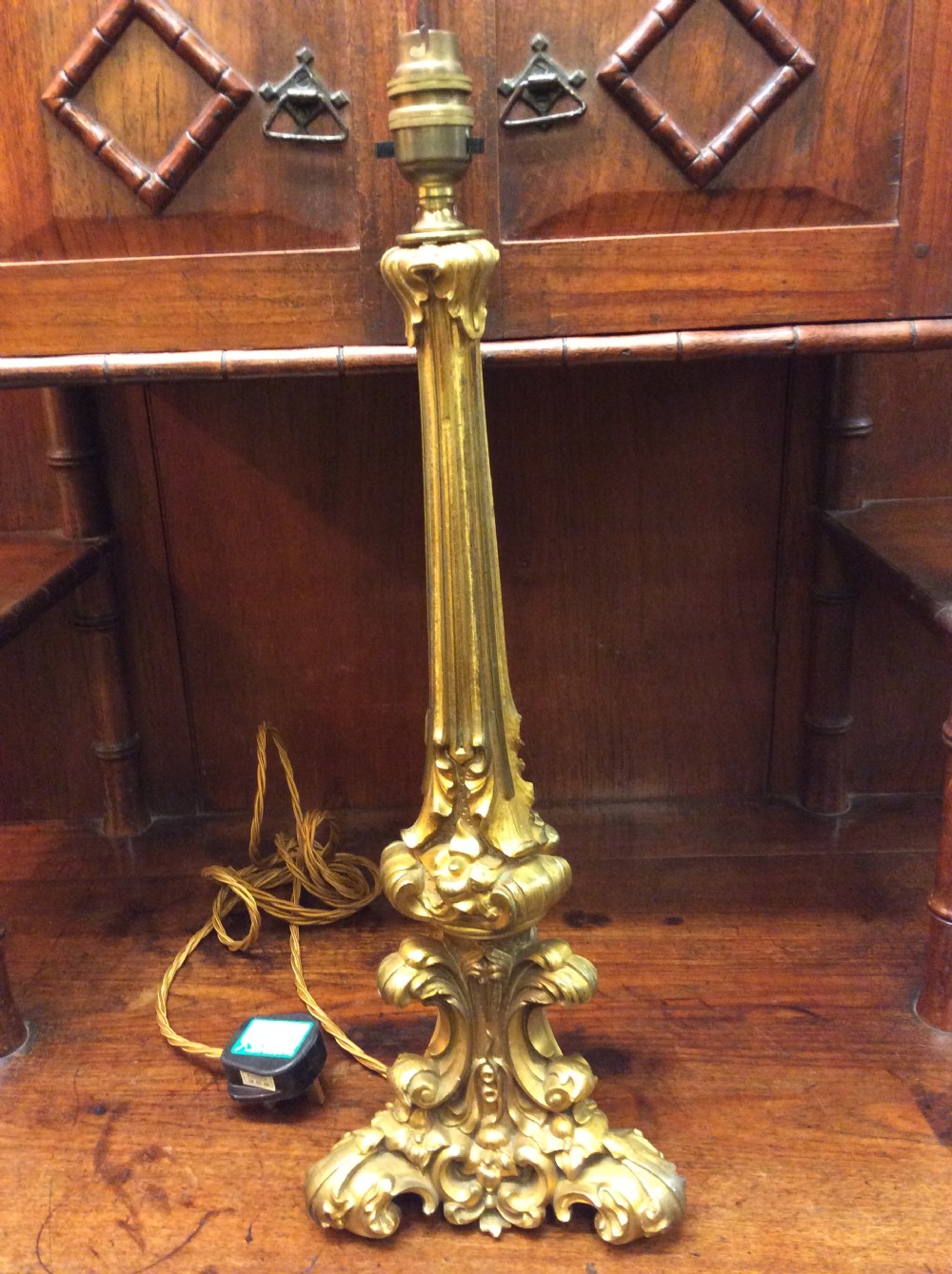 A 19thC gilt brass table lamp View V