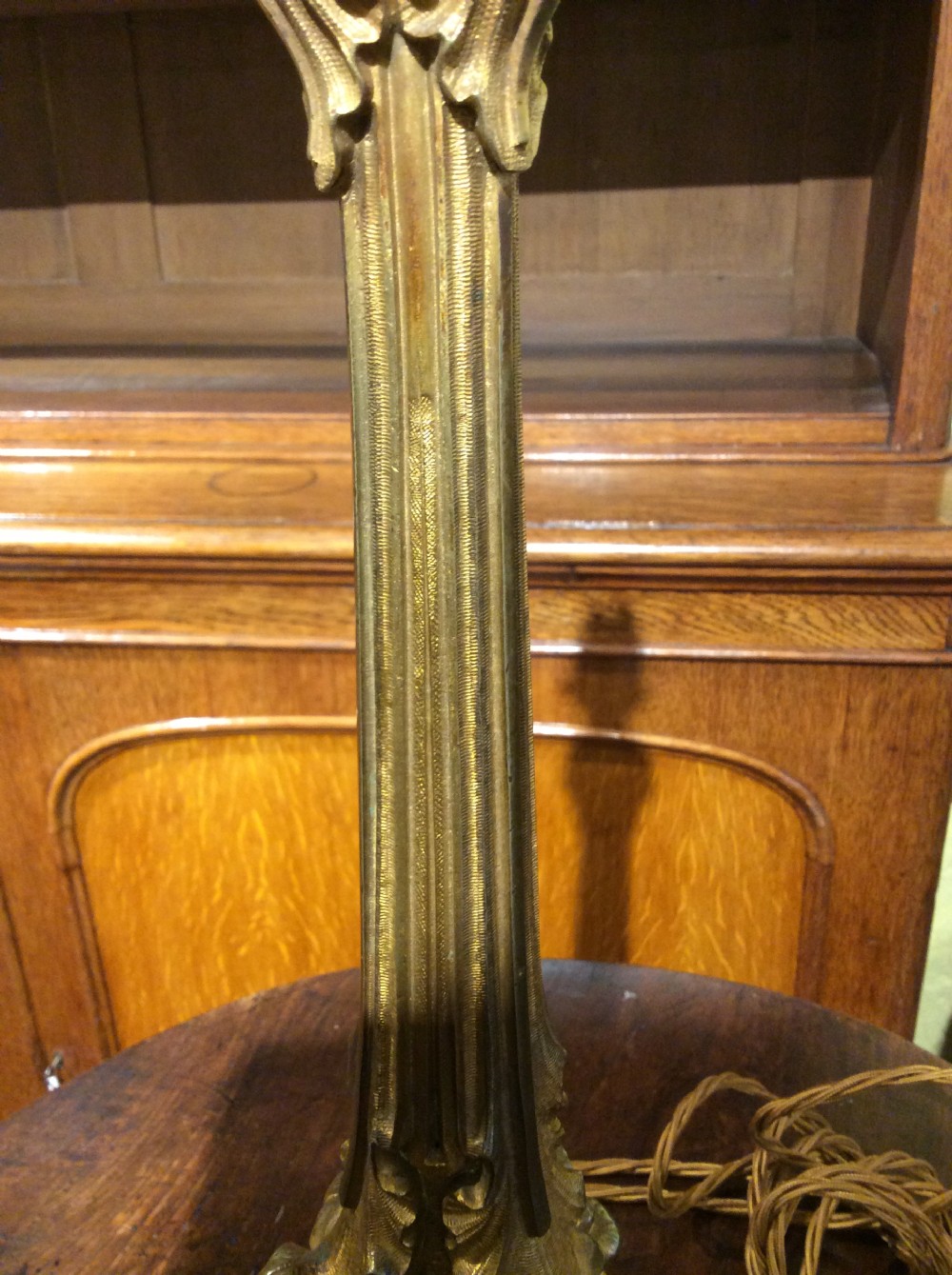 A 19thC gilt brass table lamp View VII