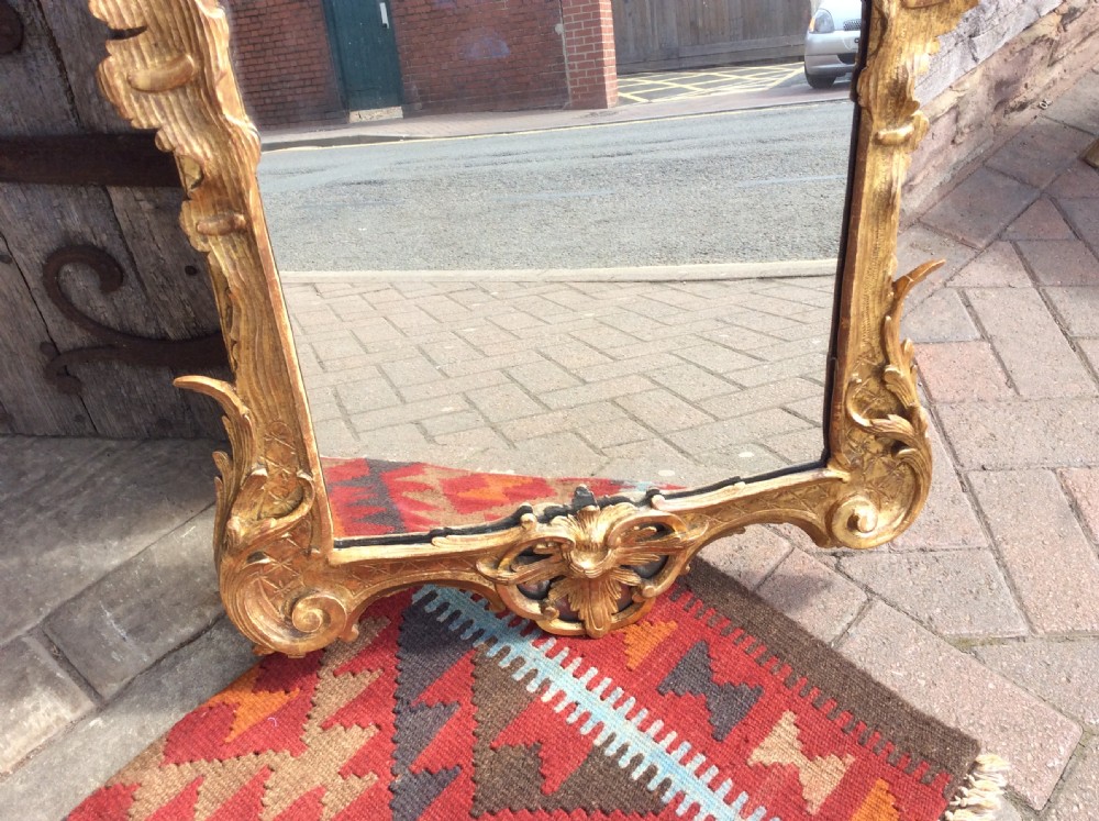 An 18thC Chippendale period gilded mirror View IV
