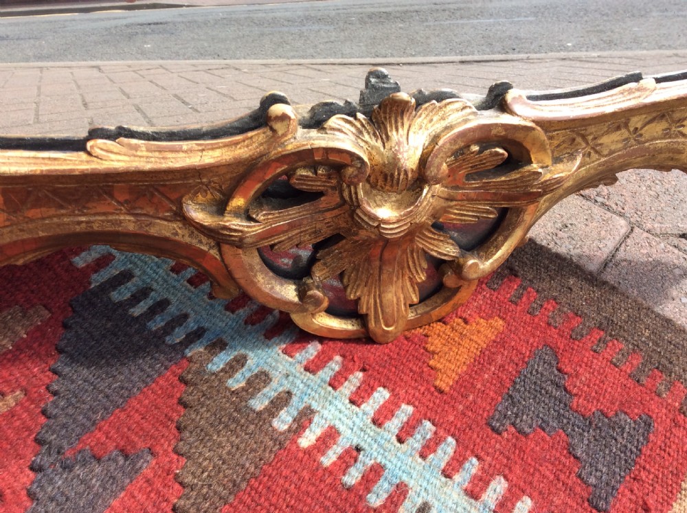 An 18thC Chippendale period gilded mirror View V