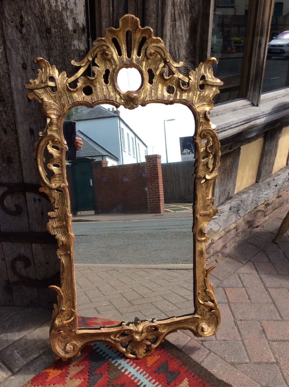 An 18thC Chippendale period gilded mirror View VIII