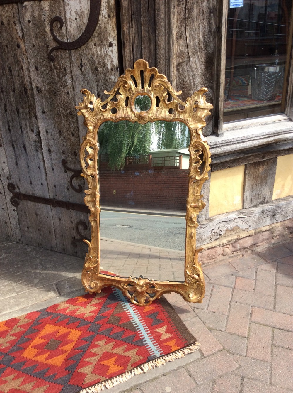 An 18thC Chippendale period gilded mirror View IX