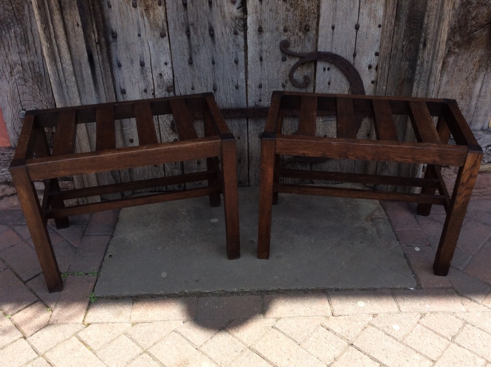 A  pair of early 20thC oak luggage racks