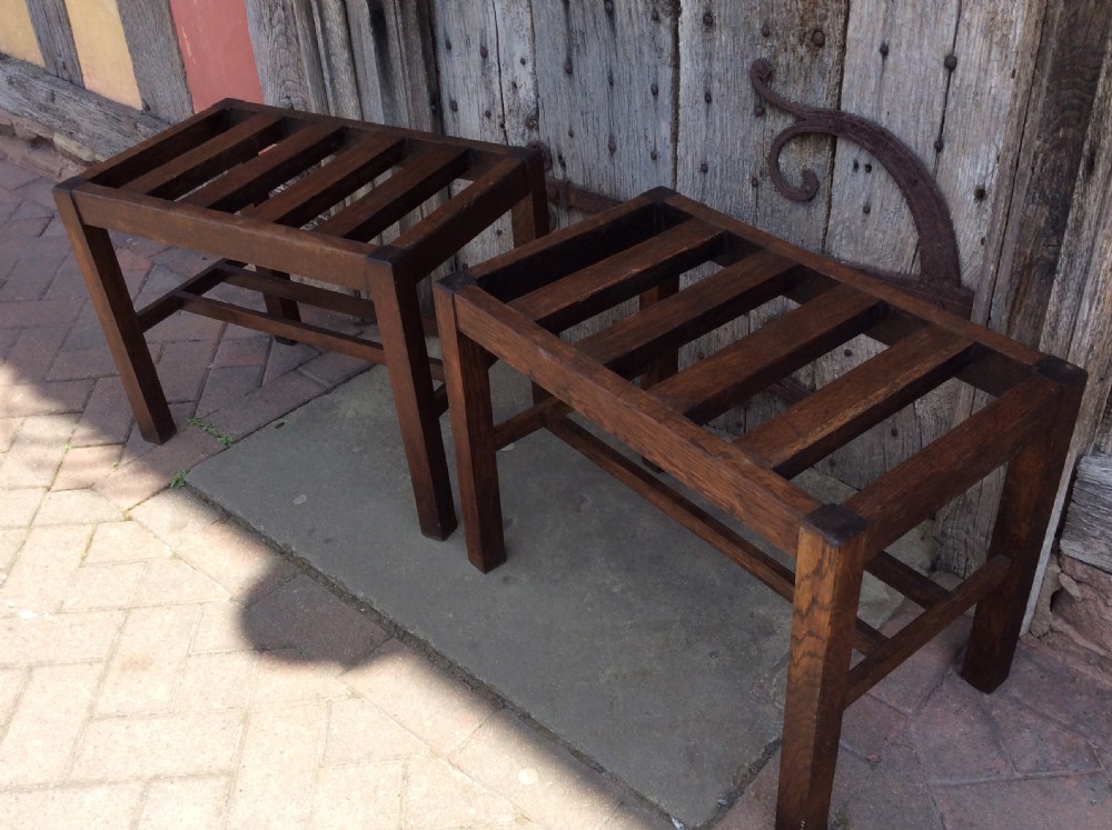 A  pair of early 20thC oak luggage racks View II