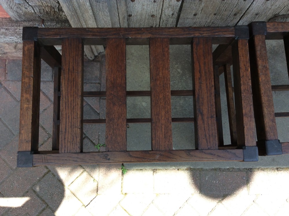 A  pair of early 20thC oak luggage racks View V