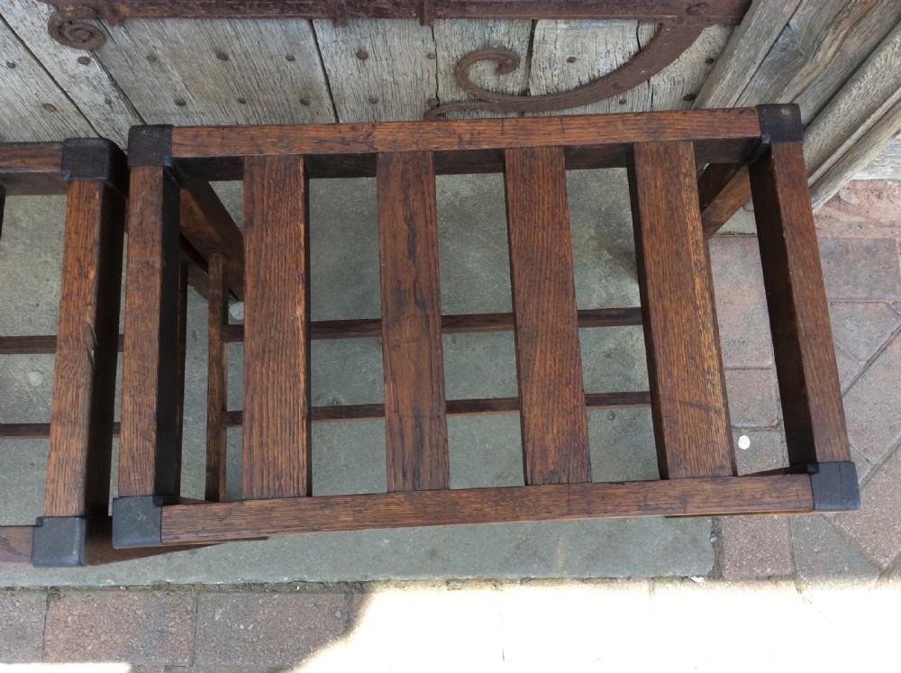 A  pair of early 20thC oak luggage racks View VI