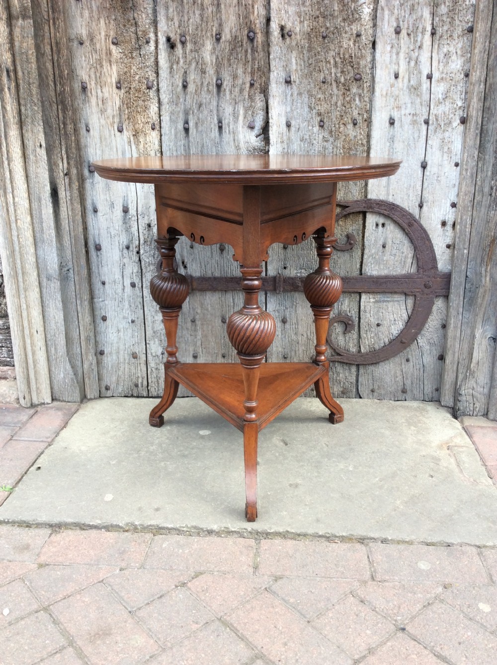A 19thC Howard & Sons walnut table