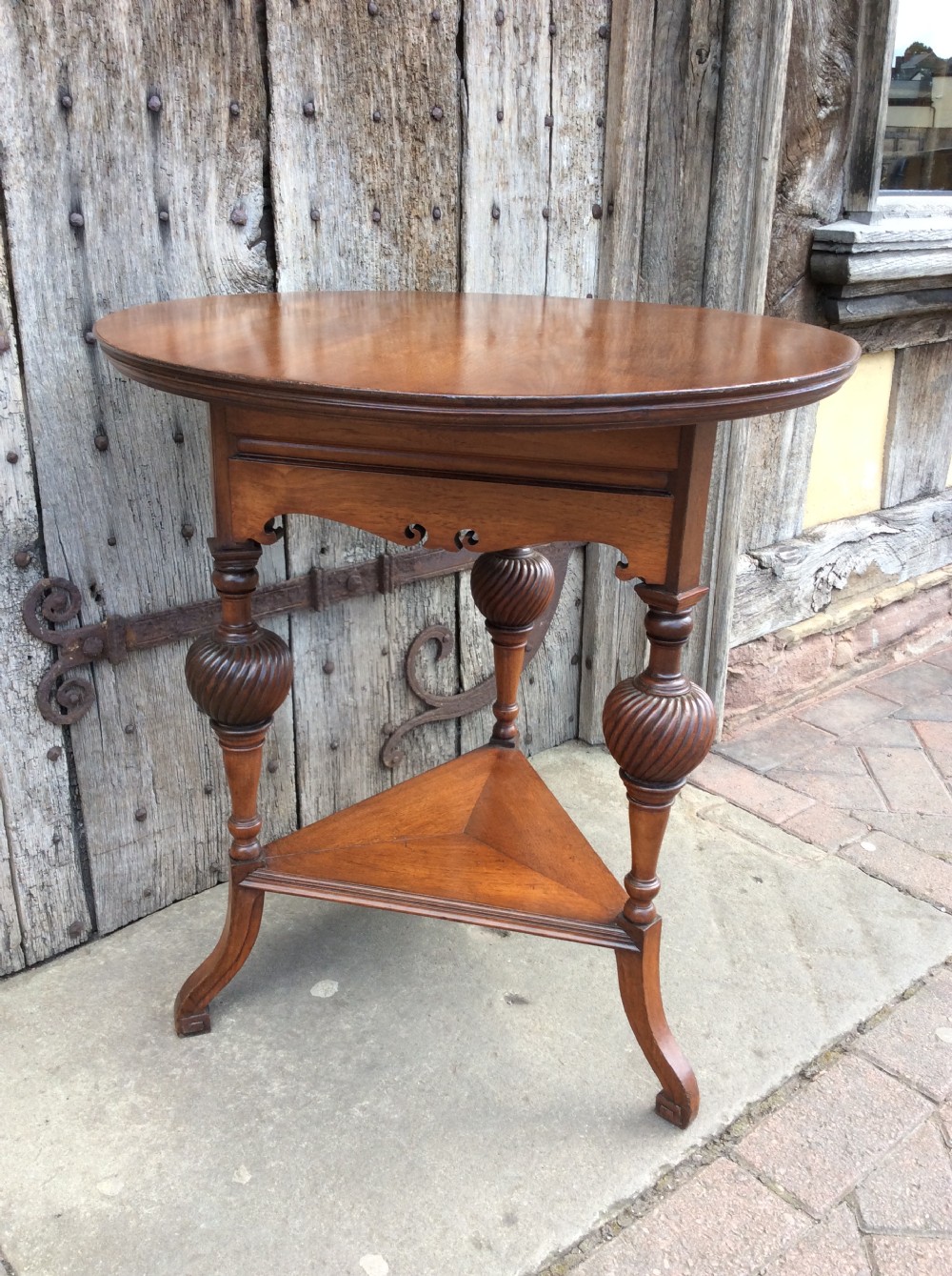 A 19thC Howard & Sons walnut table View II