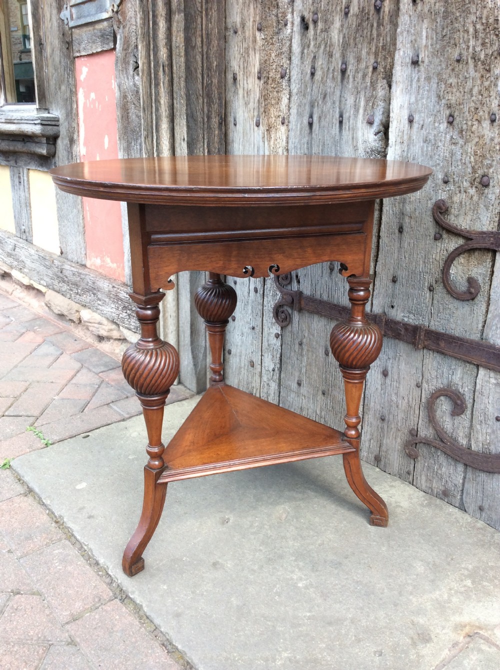 A 19thC Howard & Sons walnut table View III