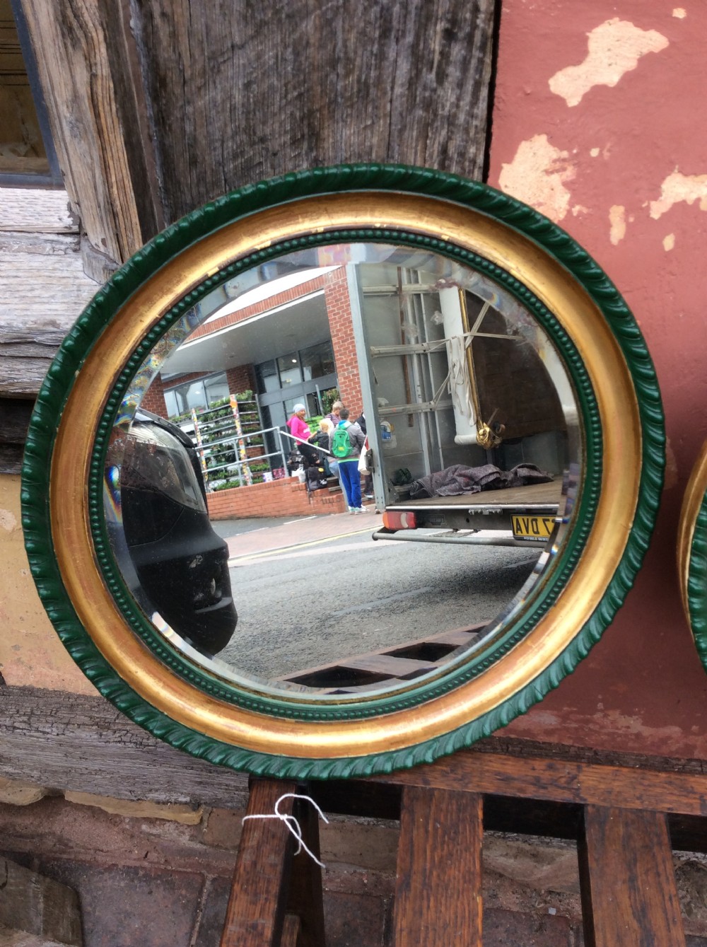 A 19thC Pair of decorated circular bevelled mirrors View II