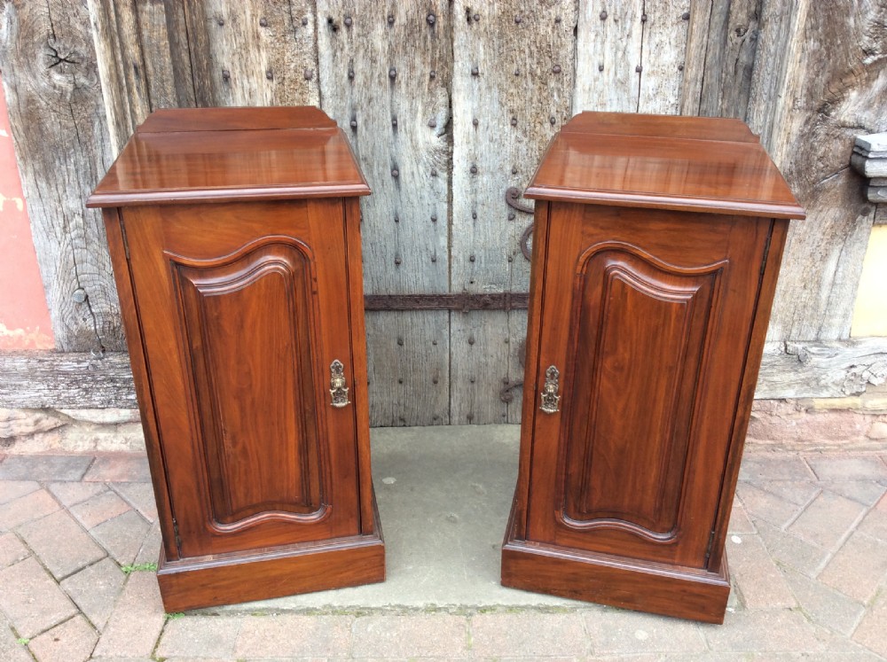 A pair of 19thC mahogany bedside cabinets