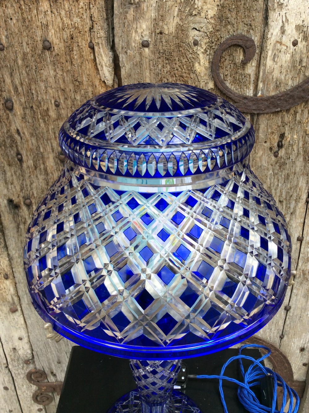 A blue overlay cut glass table lamp View II