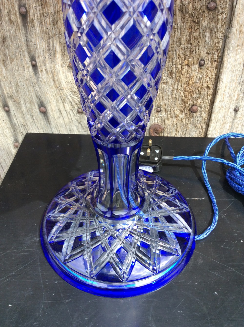 A blue overlay cut glass table lamp View III