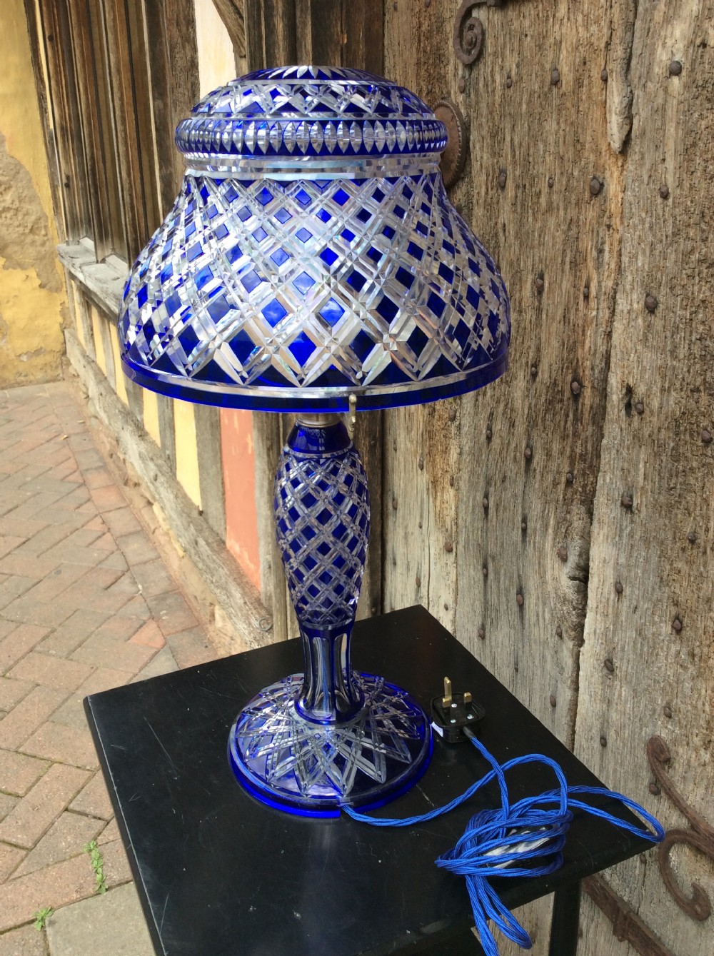 A blue overlay cut glass table lamp View VI