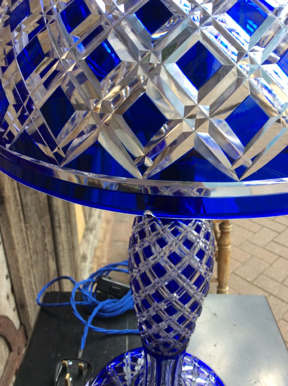 A blue overlay cut glass table lamp View VII