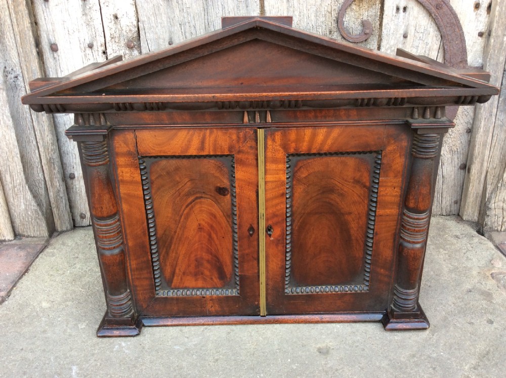 An Early 19thC architectural mahogany wall cabinet View III