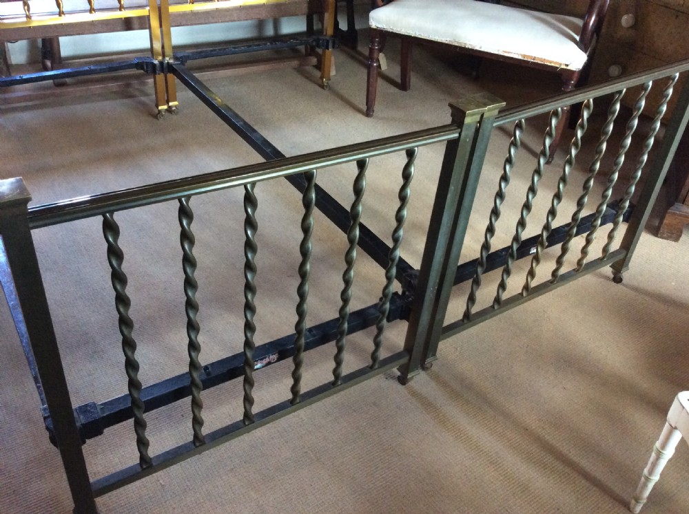 A pair of 19thC single brass beds by Hoskins View IV