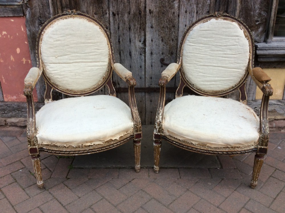 A pair of 19thC French country house elbow armchairs View XIV