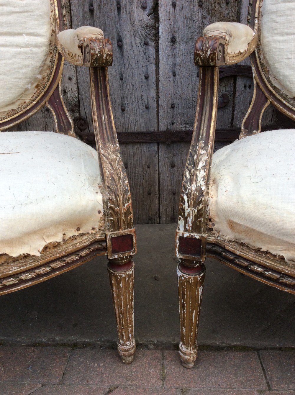 A pair of 19thC French country house elbow armchairs View IV