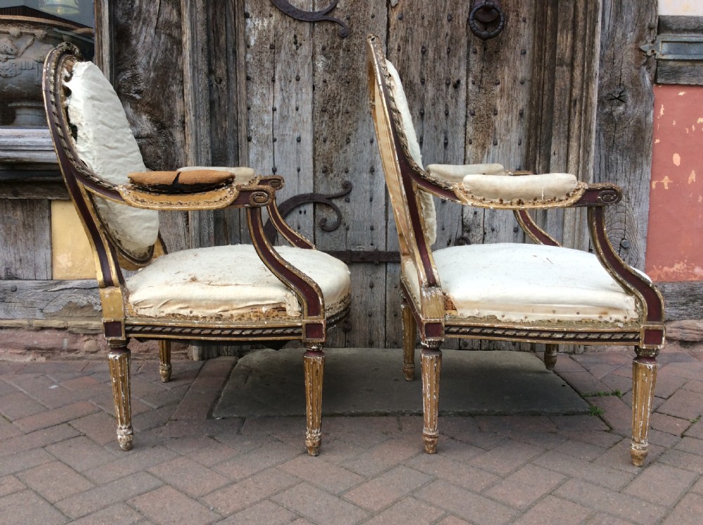 A pair of 19thC French country house elbow armchairs View VI