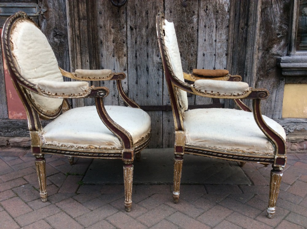 A pair of 19thC French country house elbow armchairs View IX