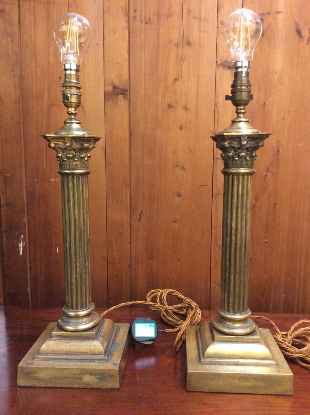 A Pair of Edwardian brass Corinthian column table lamps