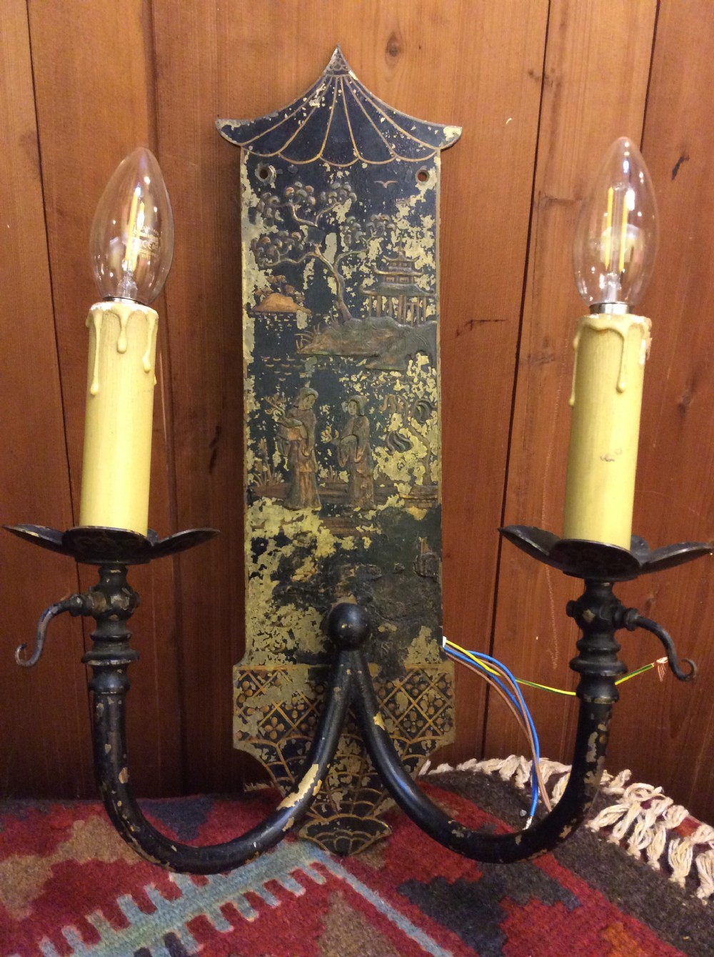 A 19thC lacquered wall light 