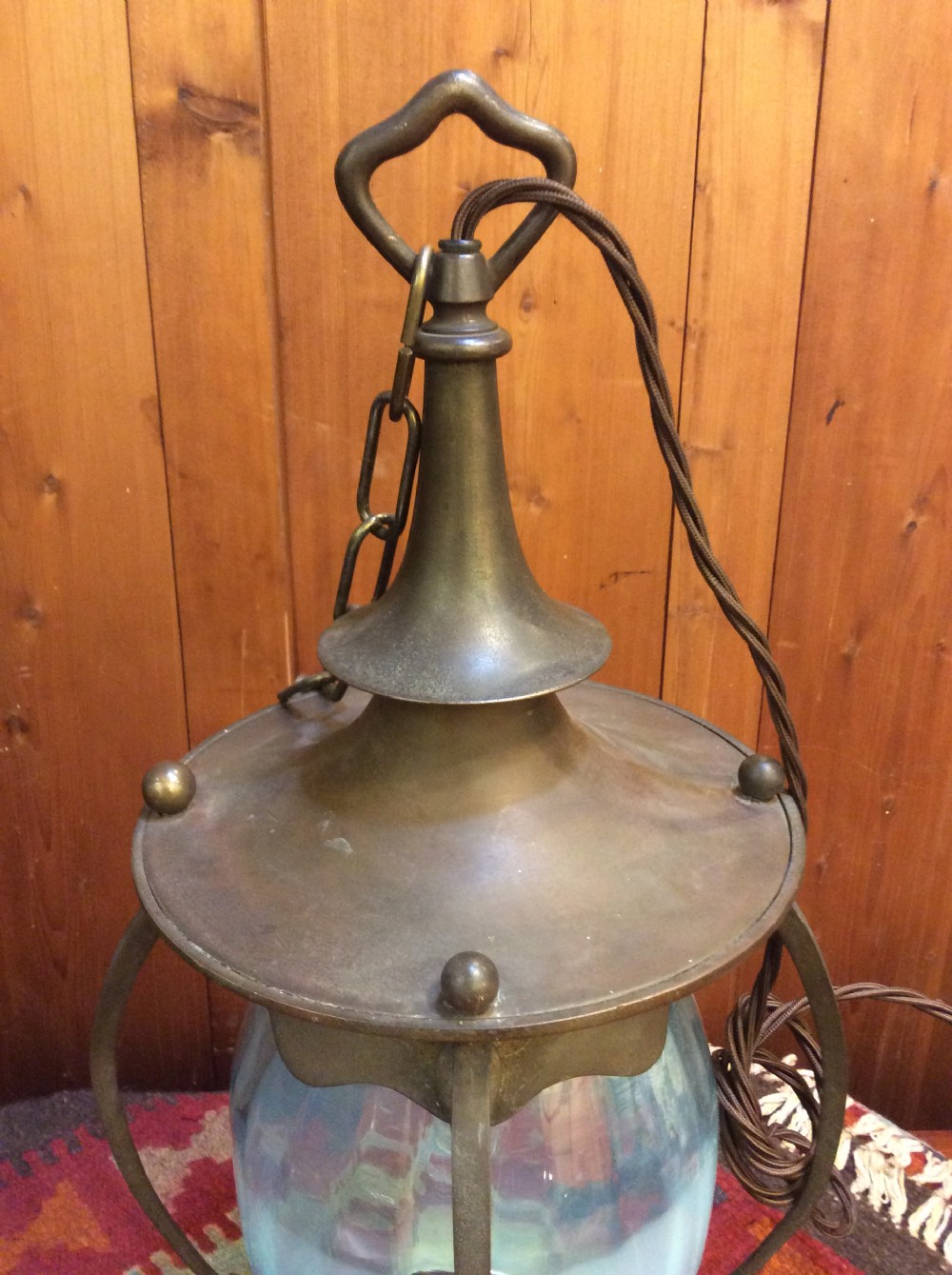 An Arts & Crafts copper and brass lantern View II