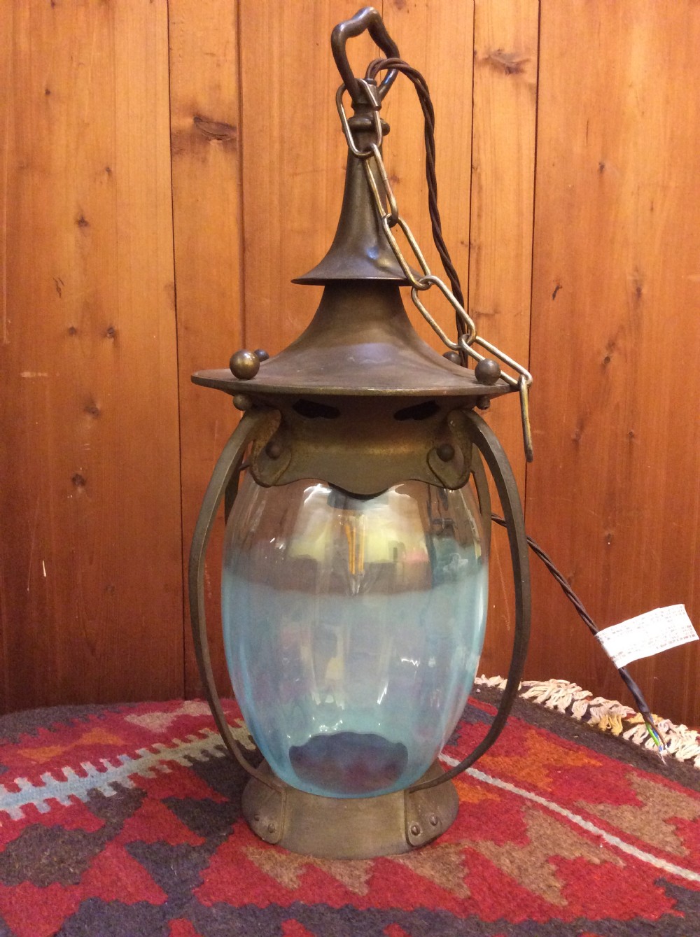 An Arts & Crafts copper and brass lantern View V