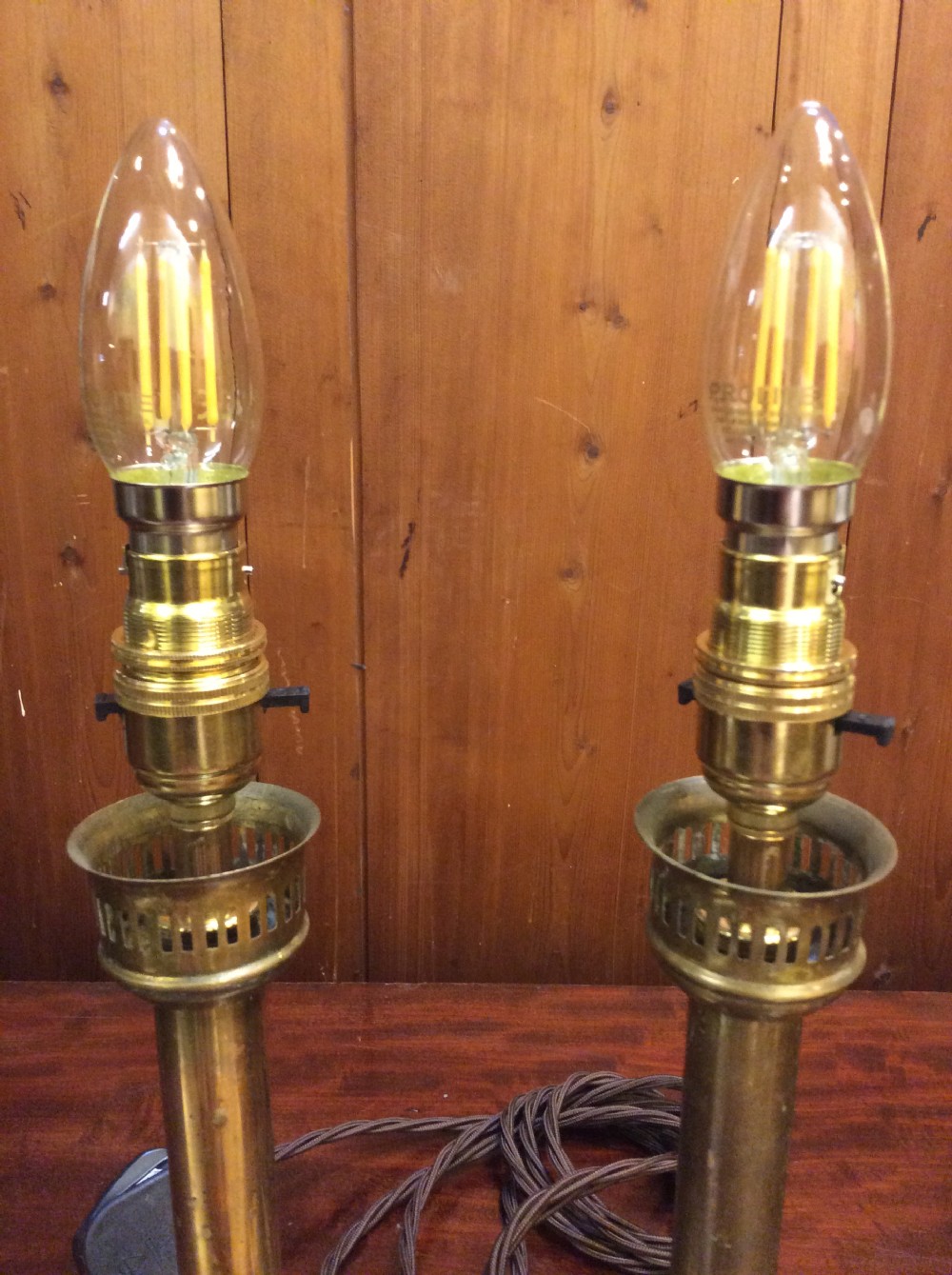 A pair of Edwardian brass table lamps View II