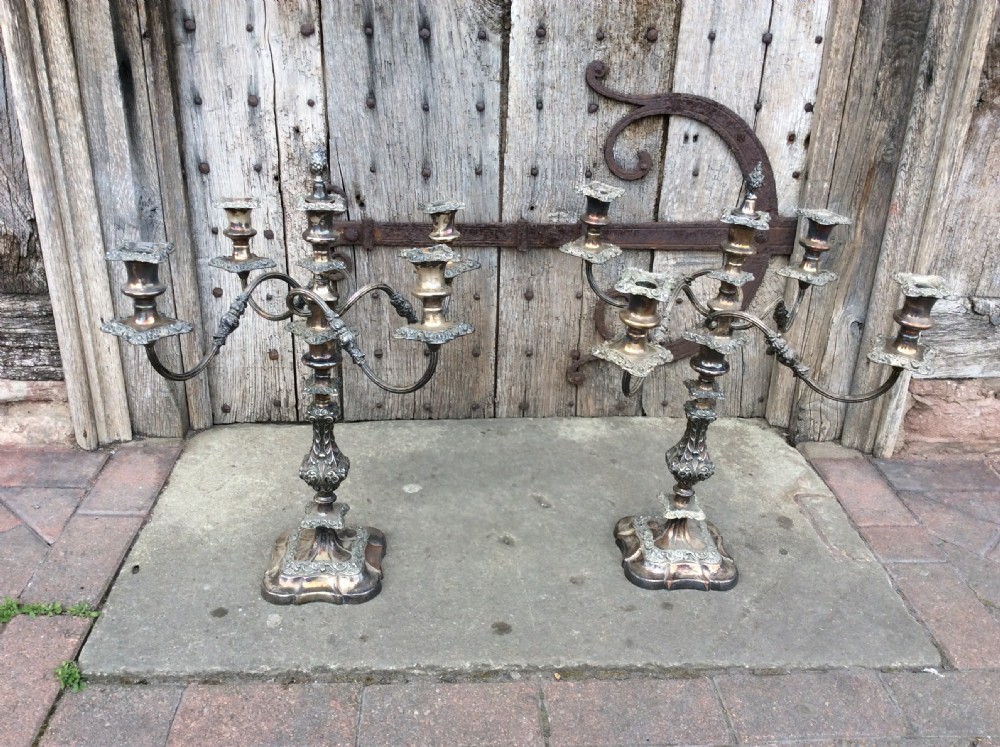A Pair of silverplated on copper 5 sconce candelabras