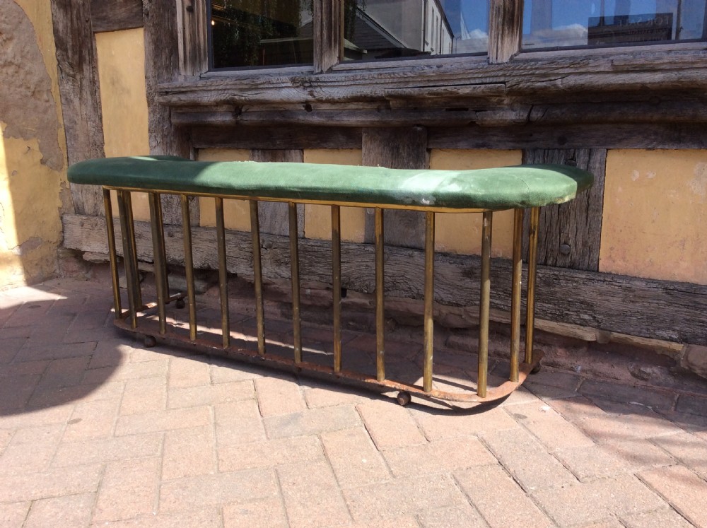 A 19thC brass and steel fender 