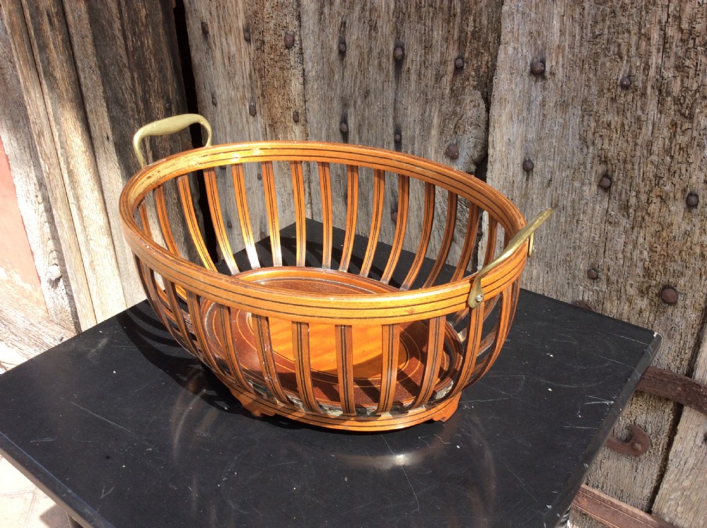 An Edwardian mahogany bread basket View III