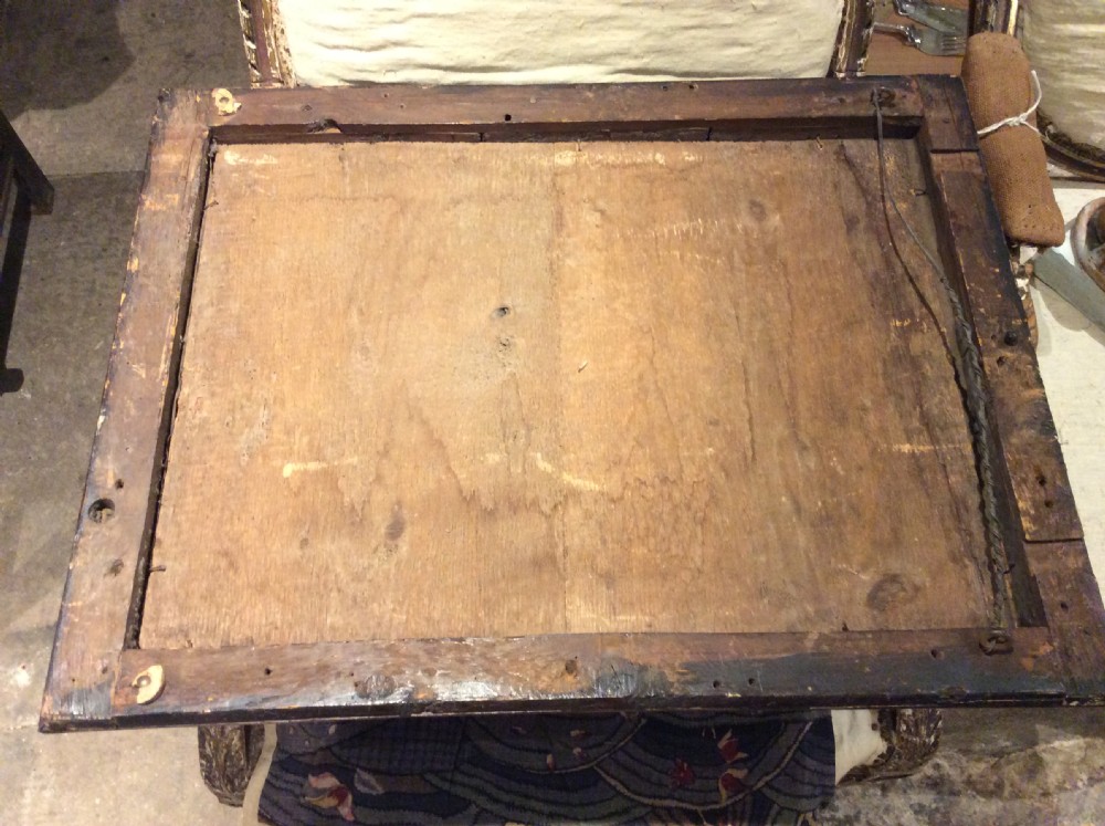 An 18thC Verneered walnut cushion mirror View VII