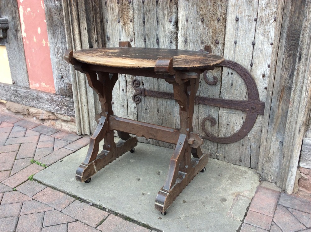 An Arts & Crafts gothic revival oak table View III