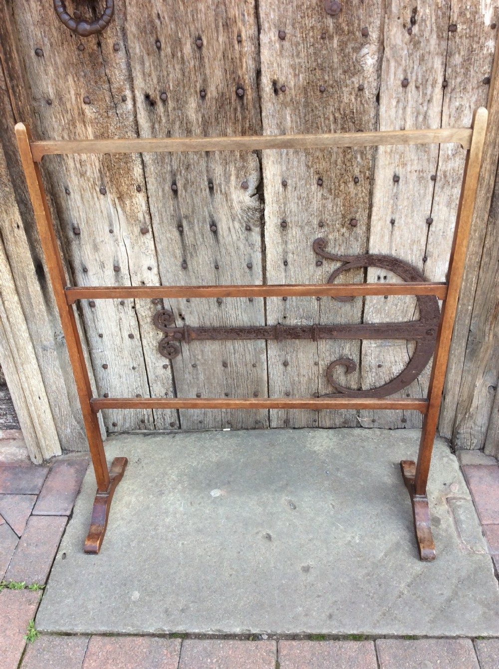 An Edwardian English walnut  towel rail View II