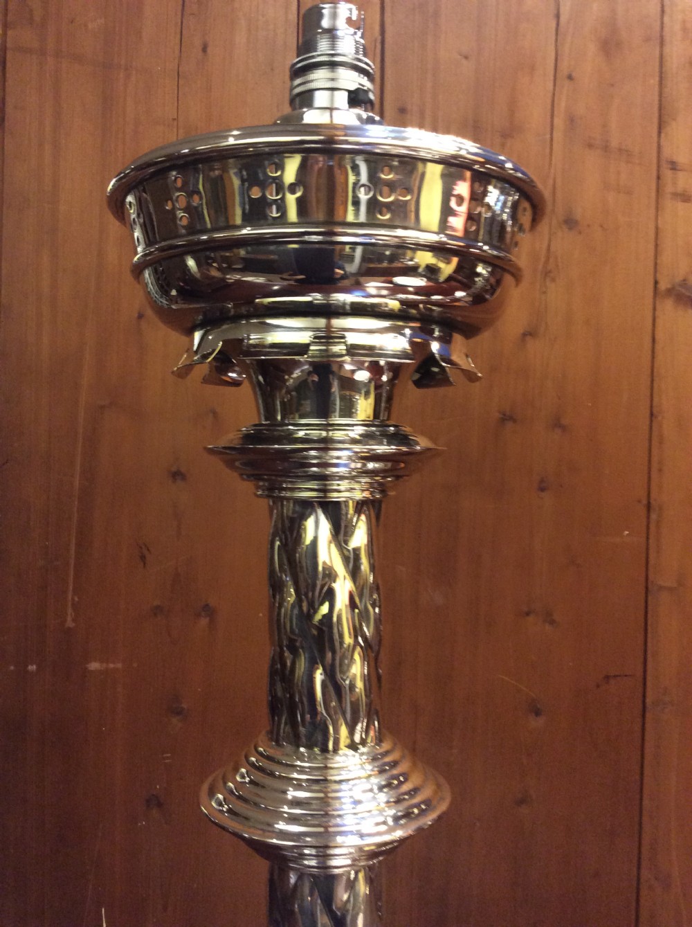 A pair of Edwardian silver plated converted Gothic candlesticks View III