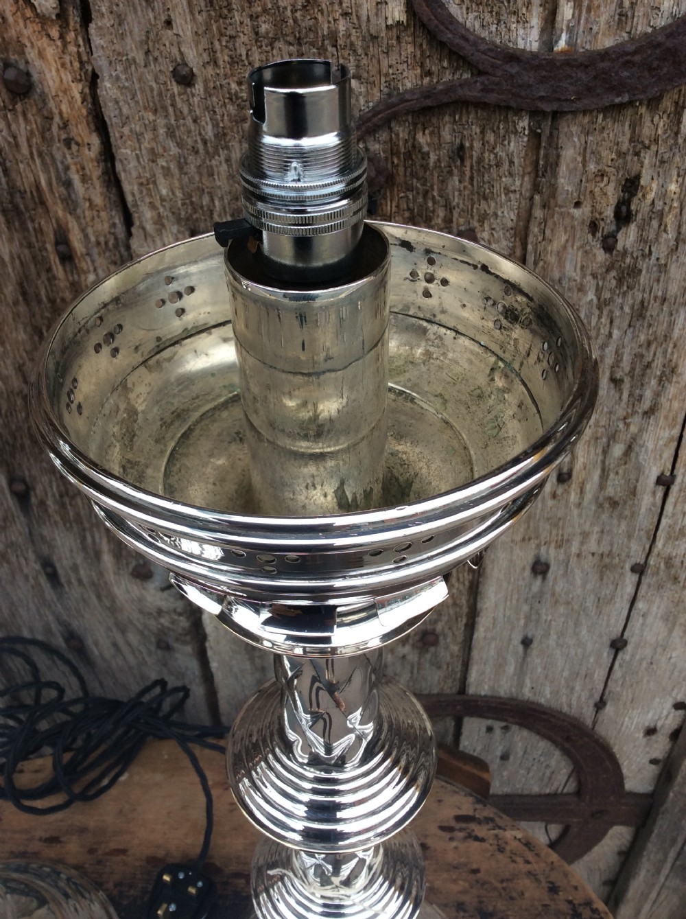 A pair of Edwardian silverplated converted Gothic candlesticks View III