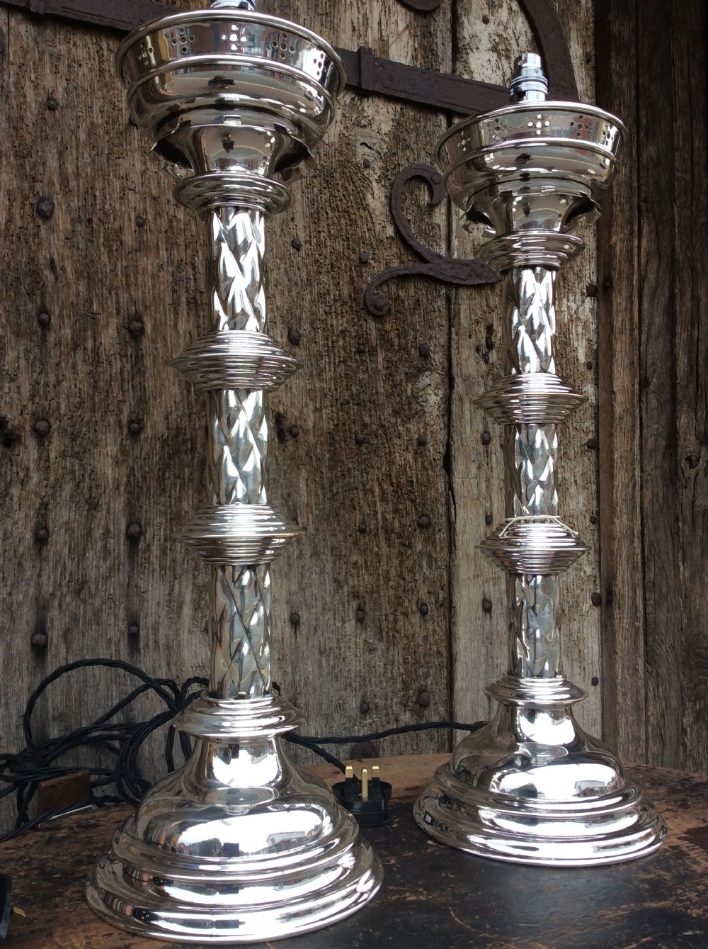 A pair of Edwardian silverplated converted Gothic candlesticks View IV