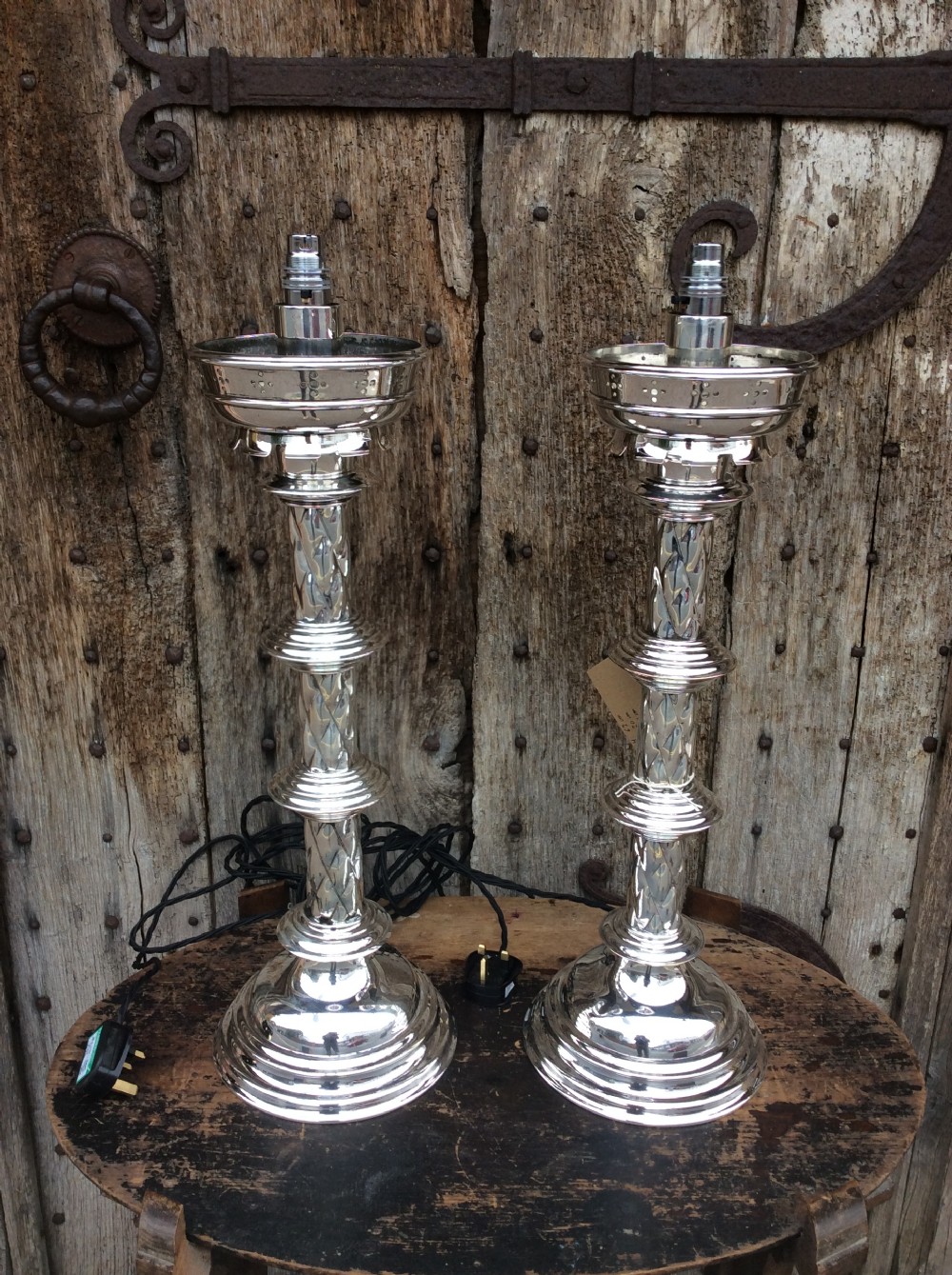 A pair of Edwardian silverplated converted Gothic candlesticks View IX