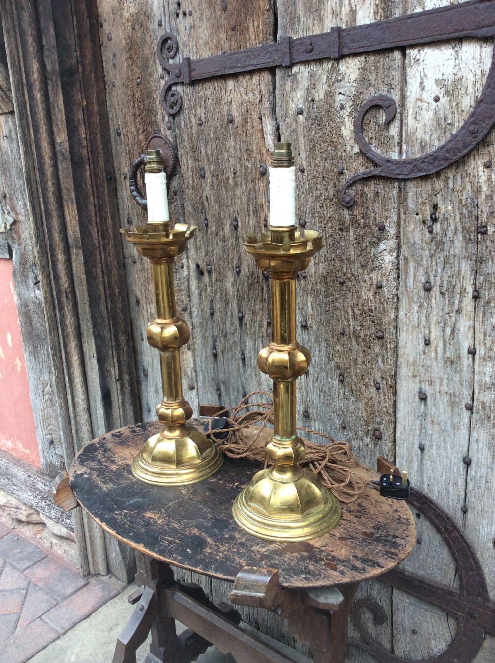 A pair of Gothic revival brass table lamps View II