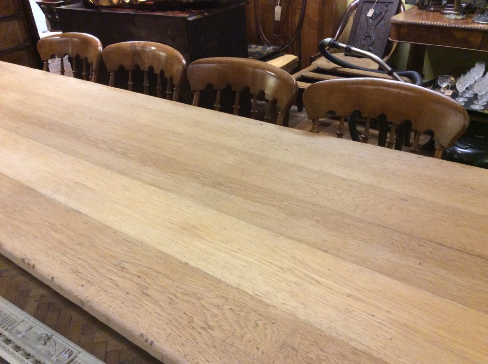 An early 20thC 10 seater oak refectory table View III