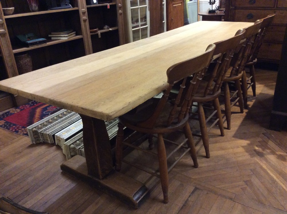 An early 20thC 10 seater oak refectory table View IV