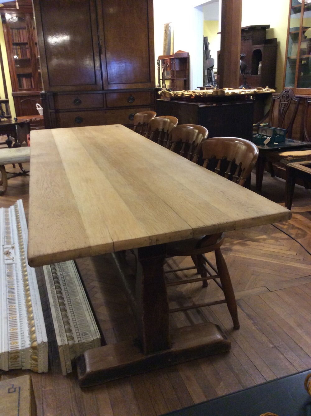 An early 20thC 10 seater oak refectory table View VI