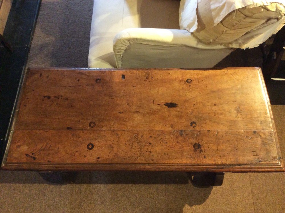 An 18thC walnut table View IX