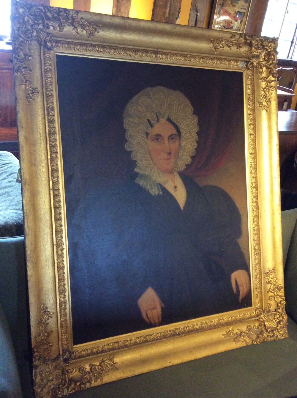 A 19thC oil painting of a lady in gilded frame View II
