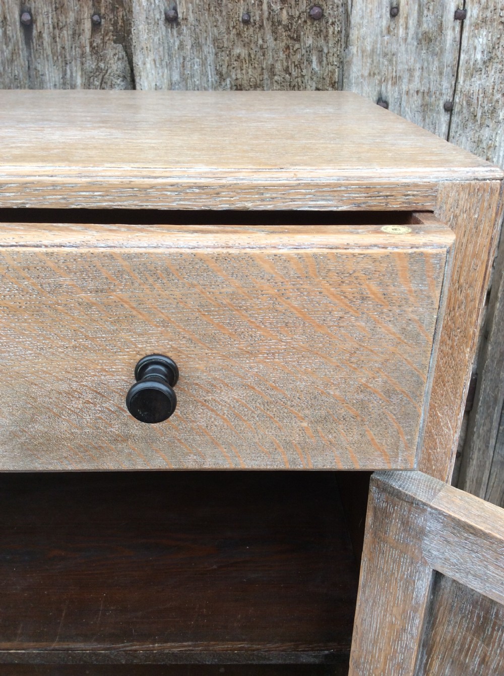 A 20thC light oak Heals cupboard View VI