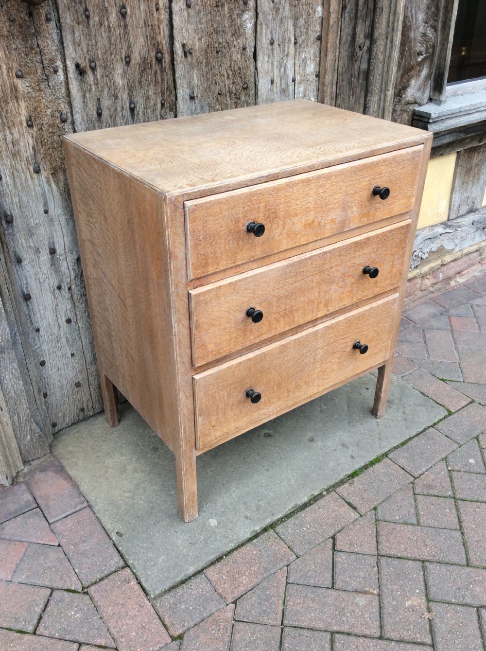 A 20thC pale oak Heals chest of drawers View II